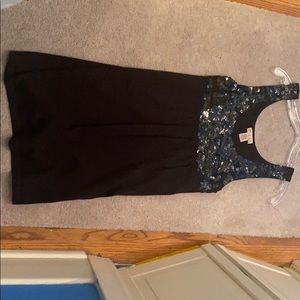 Black sequin on upper, black light sweater bottom